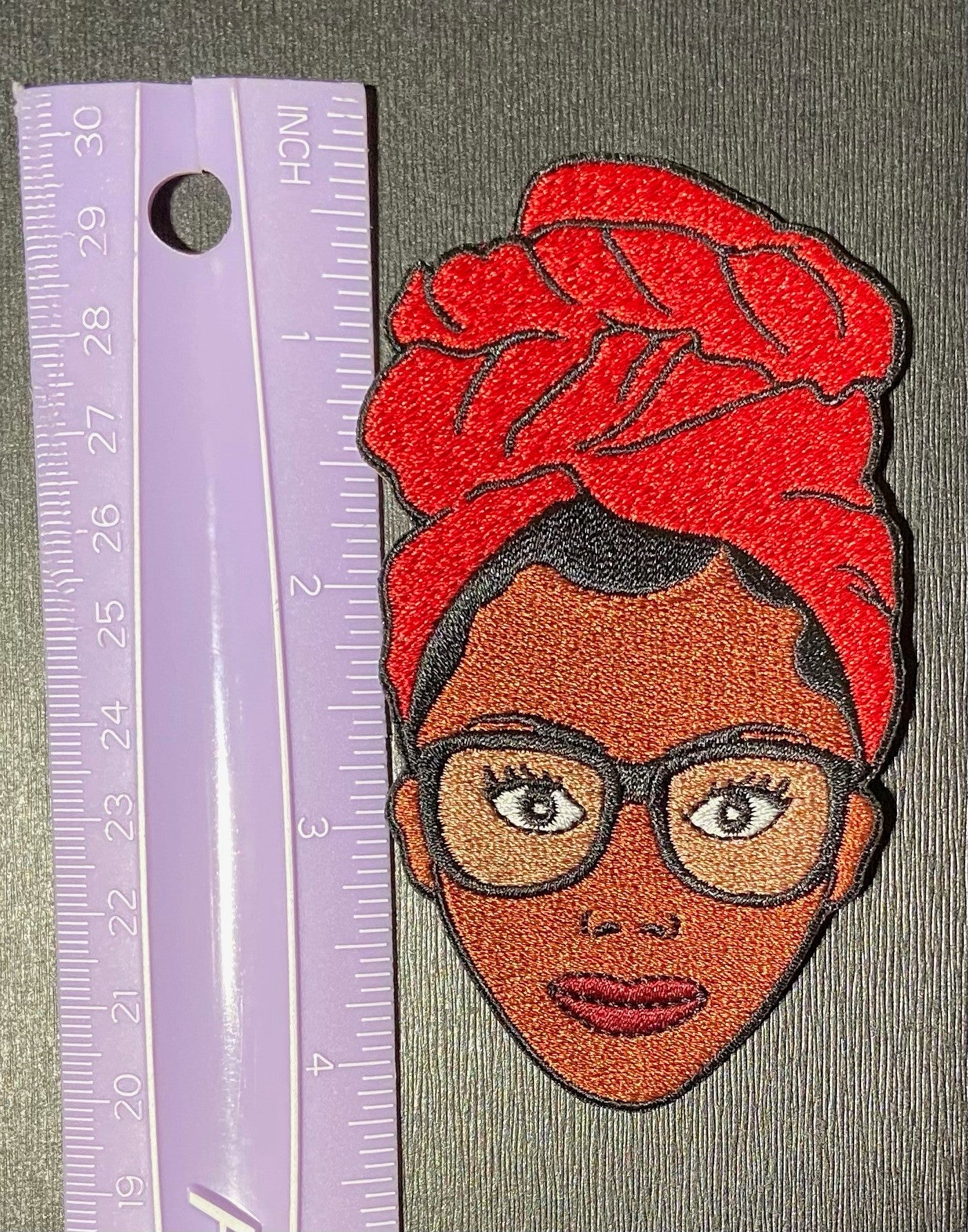 Wrapped Avah - Embroidered Iron-On Patch